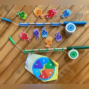 Melissa & Doug Magnetic Fishing Game with Blue and Green Rods and Mesh Bag